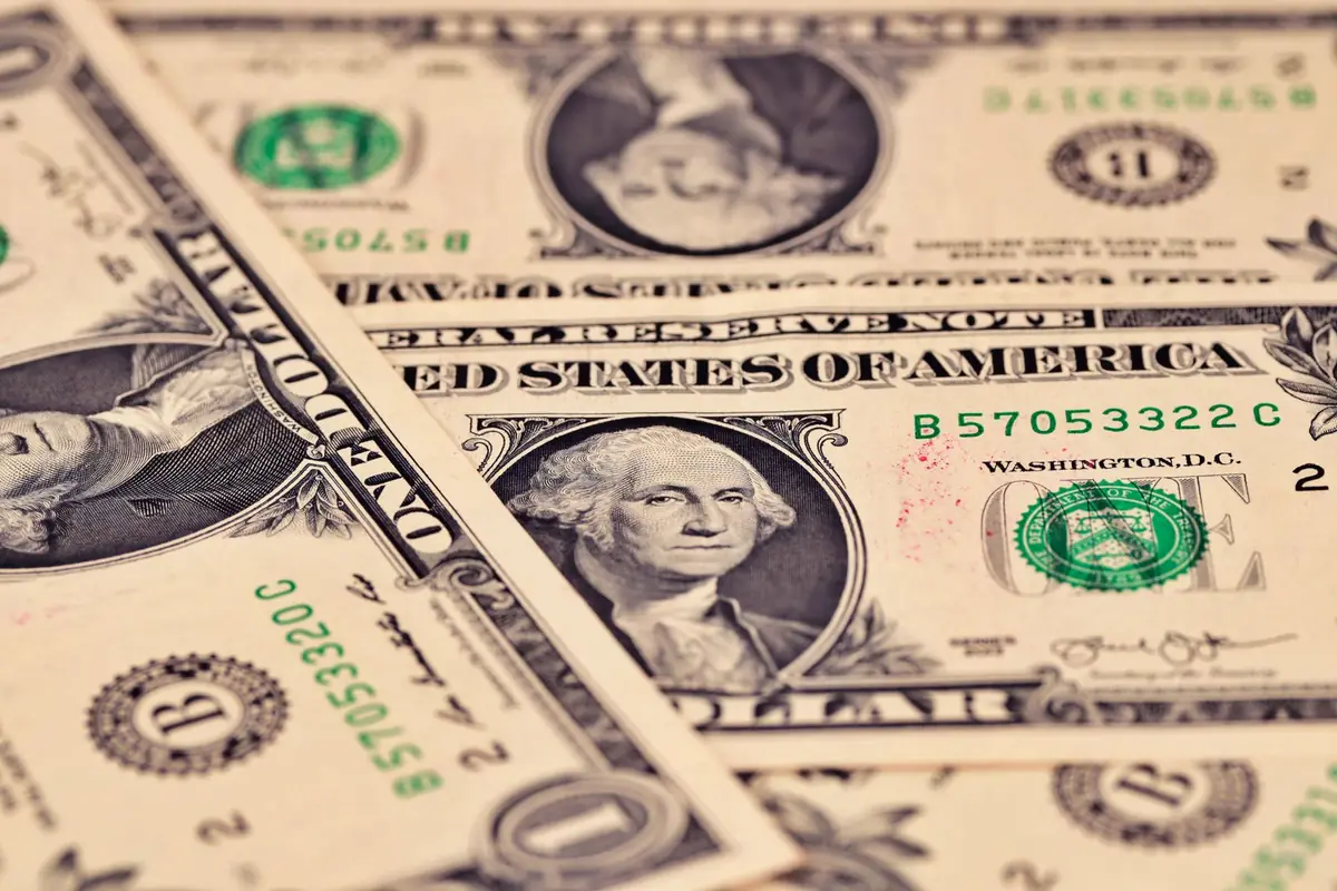 Close-up of several US one dollar bills