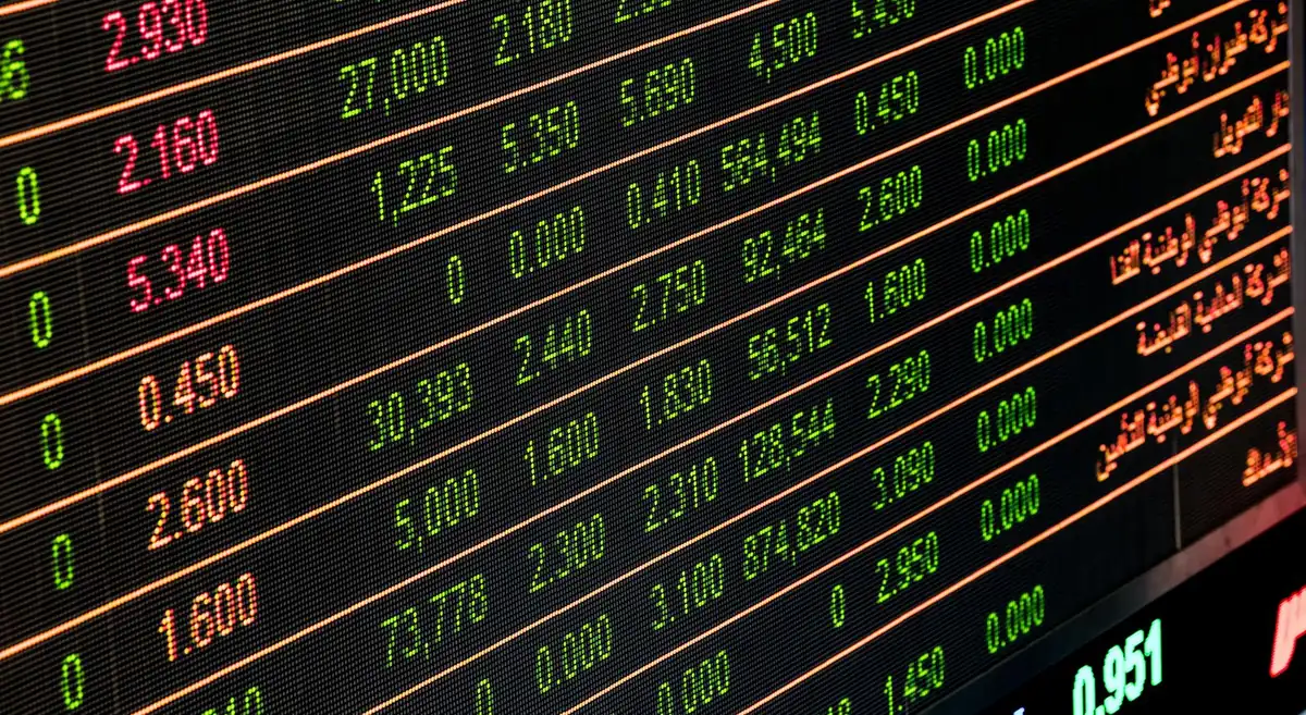 A trading screen of prices in green, red and orange